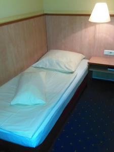 Ein Bett oder Betten in einem Zimmer der Unterkunft Landgasthof Bei Kleins