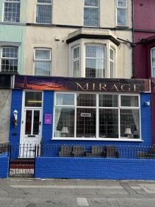a blue building with a sign that reads imperial at Mirage Hotel in Blackpool
