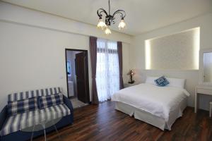 Llit o llits en una habitació de Yuli Happiness B&B花蓮縣民宿2068號