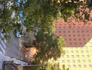 a view of a tall building in a city at Hostal Mónaco in Valladolid