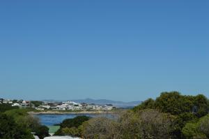 a view of a river with houses and trees at 2 Bedroom sea view studio in Onrus in Hermanus +26 photos