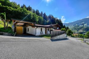 a house on the side of a road at Appartements Oberdorfer in Landeck