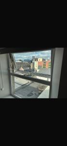 a view of a city from a window at The Urban Haven in Limerick