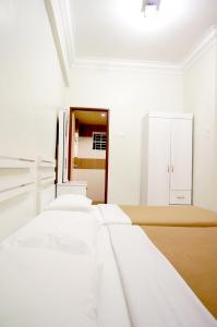 Postel nebo postele na pokoji v ubytování Cameron View Apartment @ Crown Imperial Court Brinchang