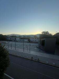 a view of a parking lot with a building at DiSte Apartman in Knin