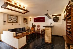 a living room with a couch and a table at Villa Cococha in Salou