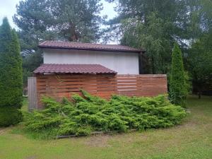 a wooden fence in front of a building at W Częstochowie in Częstochowa +4 photos