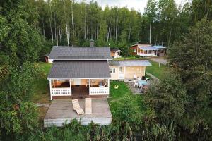 an aerial view of a house with a deck at Verlan Satumaa in Verla