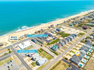 an overhead view of a beach with houses and the ocean at 4059 - Bikinis Martinis in Kitty Hawk