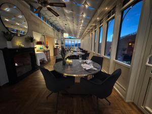 a dining room with a table and chairs at revita - naturresort & spa in Bad Lauterberg