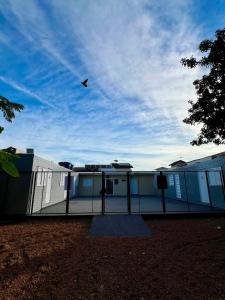 a bird flying in the sky above a building at Urban Box in Sinop