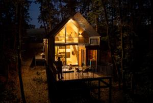 a man standing on the front porch of a house at Green House - why not in Kismaros +10 photos