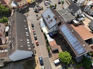 an overhead view of a house with solar panels on it at Hotel Es Lämmche in Breuberg +3 photos