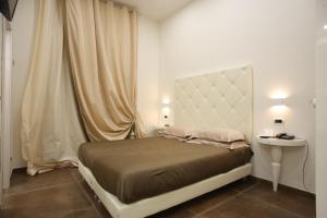 Postel nebo postele na pokoji v ubytování Hotel Columbia Wellness & Spa
