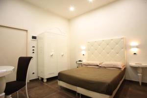Postel nebo postele na pokoji v ubytování Hotel Columbia Wellness & Spa