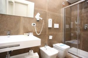 Koupelna v ubytování Hotel Columbia Wellness & Spa