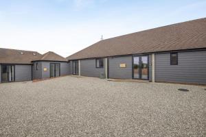 an empty driveway in front of a house at 2 Bed in Otterden oc-c36010 in Otterden