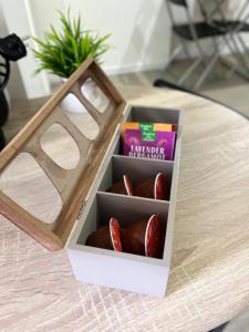 a box of chocolates sitting on a table at Studio relax in Villeneuve-Saint-Georges