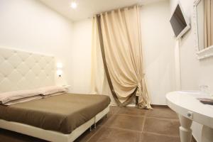 TV a/nebo společenská místnost v ubytování Hotel Columbia Wellness & Spa