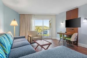 a living room with a couch and a table at Margaritaville Vacation Club - St Thomas in Frydendal