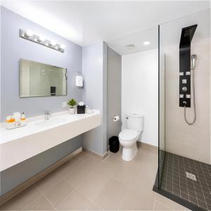 a bathroom with a sink and a toilet at Brion City Hotel BW Signature Collection in Willemstad +44 photos