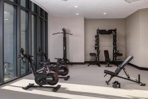 a gym with several exercise bikes in a room with windows at Hollywood Casino Aurora in Aurora