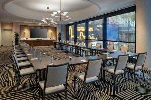 a conference room with a long table and chairs at Renaissance New York Times Square by Marriott in New York
