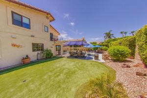 an image of a house with a yard at Pool & Yard Games! Group Retreat in La Quinta in La Quinta