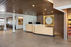 a lobby with a reception desk in a building at Fairfield by Marriott Inn & Suites Mattoon in Mattoon +51 photos