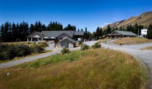 a building on the side of a road at Glentanner Park Centre in Glentanner +30 photos