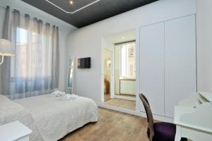 ローマにあるLuxury Apartment Sabina 50 mt from Trevi Fountainのギャラリーの写真