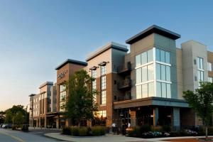 a group of buildings on a city street at Archer Hotel Boston/Burlington in Burlington