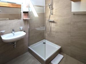a bathroom with a shower and a sink at Haus Planegg XL in Rangersdorf +58 photos