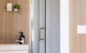 a bathroom with a sink and a faucet at Field and Fleece Farm Stay by Tiny Away in Claremont