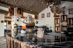 a room with a pirate ship on the wall at Hotel Paradise KMA in Bouznika