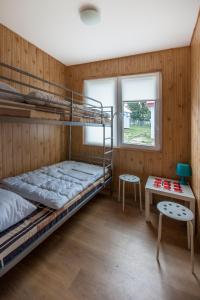 Poschodová posteľ alebo postele v izbe v ubytovaní Cuma Camp