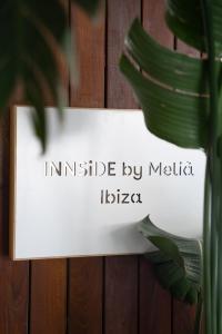 a sign with the words inside by melilla ishtar at INNSiDE by Meliá Ibiza Beach in San Antonio Bay