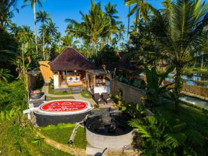 an aerial view of a house with a garden at Uma Harum Sari by Dhananjaya Hospitality in Penginyahan