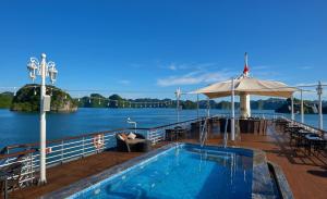 a swimming pool on the deck of a cruise ship at Paradise Elegance Cruise Halong in Ha Long