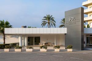 a rendering of the exterior of a modern apartment building at SOL by Meliá Marbella Estepona - Atalaya Park in Estepona