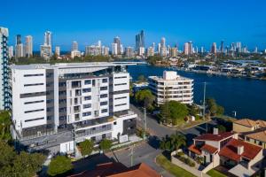 an aerial view of a city with a river and buildings at Peninsular Gold Coast in Gold Coast