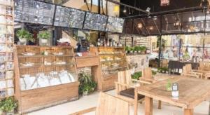 a store with wooden tables and plants in it at Pacific Regency Hotel Shenyang in Shenyang