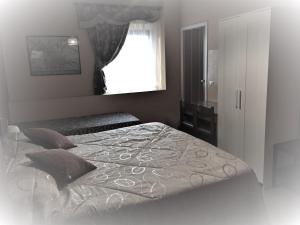 Postel nebo postele na pokoji v ubytování Hotel Aline