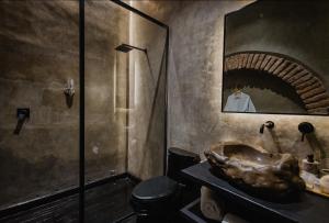 a bathroom with a sink and a shower at Casa Levonka in Oaxaca City +46 photos