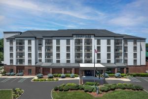 a rendering of a hotel with a building at Courtyard by Marriott Bloomington in Bloomington
