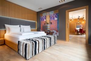 a bedroom with a large bed in a room at INNSiDE by Meliá Prague Old Town in Prague