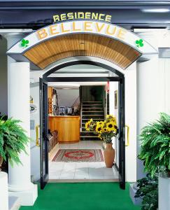 a entrance to a house with a welcome sign at Residence Bellevue in Gabicce Mare