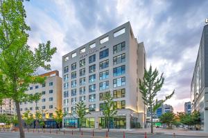 a rendering of a hotel building in a city at Daegu Hyeonpung Prana Hotel in Daegu