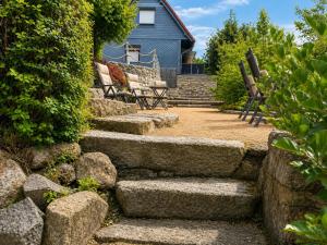 a set of stone stairs leading to a house at Alte Faktorei Schierke in Schierke