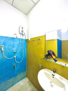a bathroom with a shower and a sink at Splendid Lake View Safari Lodge in Udawalawe +73 photos